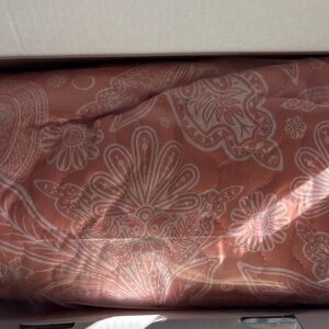 Floral Patterned Quilt in Terracotta